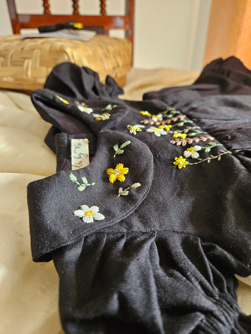 Bee Dress: Hand Embroidered Knee Length Black Dress In Moss Cotton Fabric With Bowclip