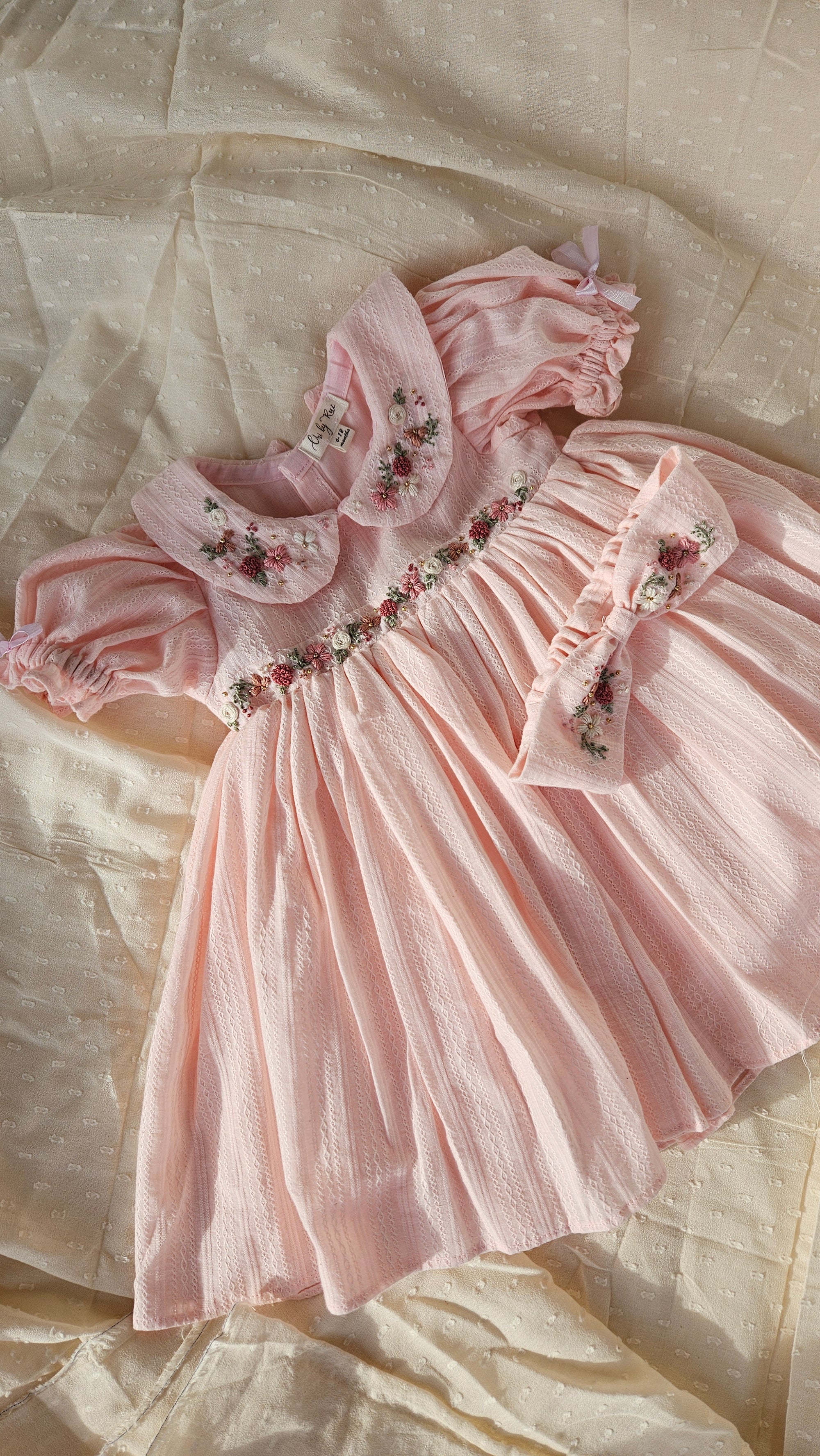 Peachy Peep: Hand Embroidered Knee Length Off-peach Dress In Cotton Jacquard Fabric With Headband