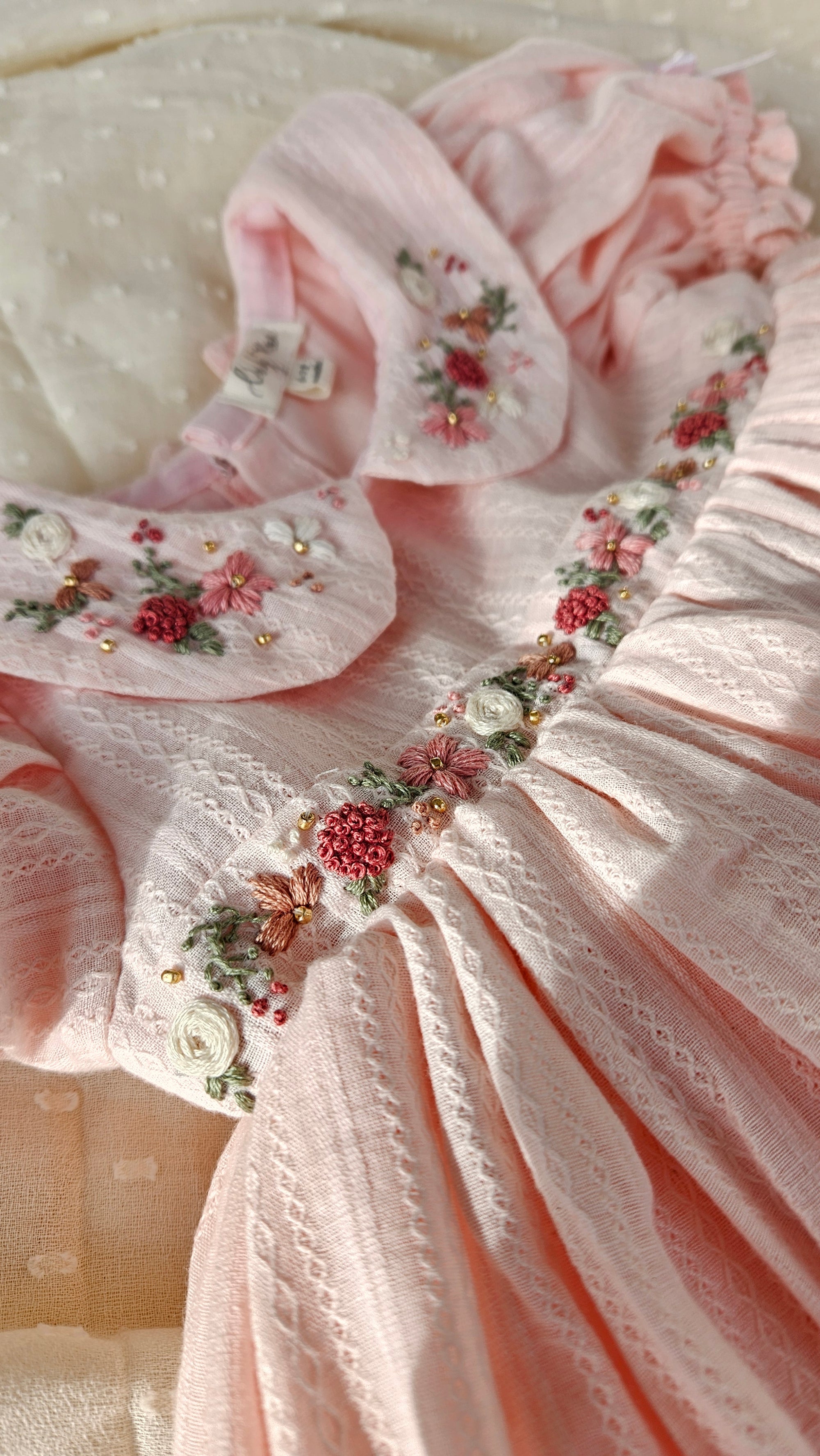 Peachy Peep: Hand Embroidered Knee Length Off-peach Dress In Cotton Jacquard Fabric With Headband