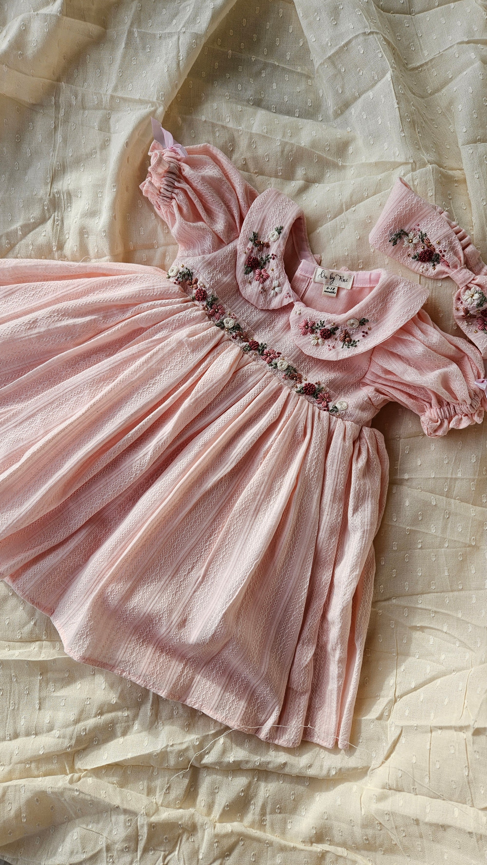 Peachy Peep: Hand Embroidered Knee Length Off-peach Dress In Cotton Jacquard Fabric With Headband