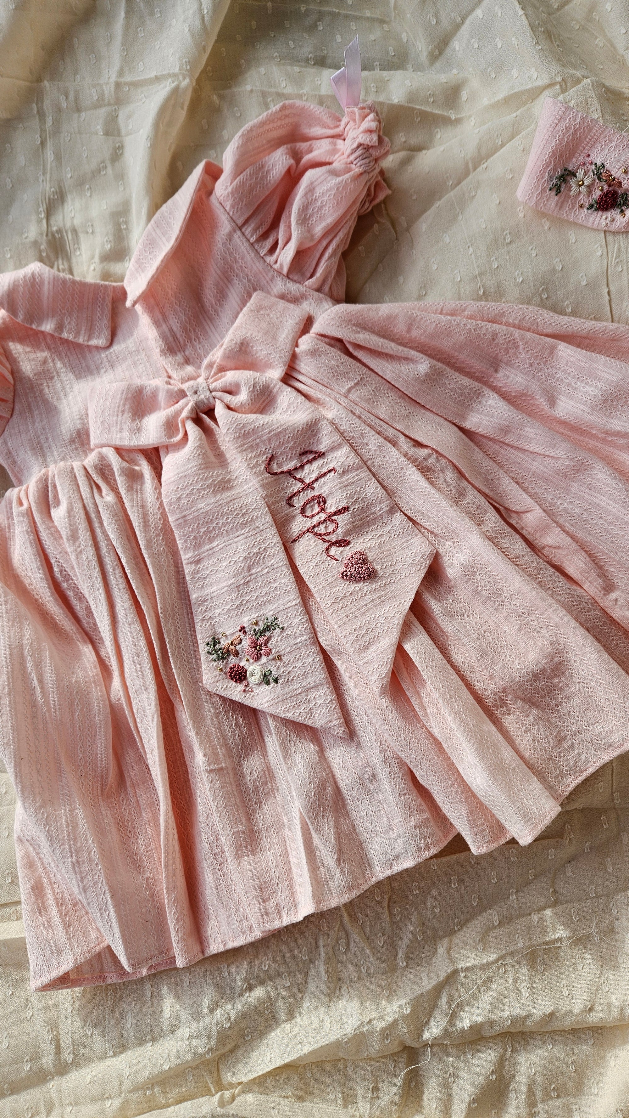 Peachy Peep: Hand Embroidered Knee Length Off-peach Dress In Cotton Jacquard Fabric With Headband