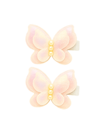 Two pastel butterfly-shaped hair clips on a white background