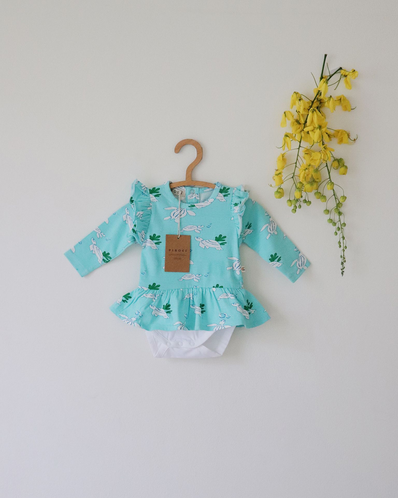 Organic Peplum Onesie (Turtle Print)