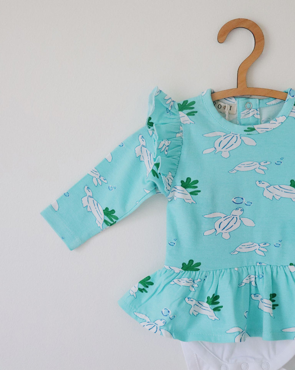 Organic Peplum Onesie (Turtle Print)