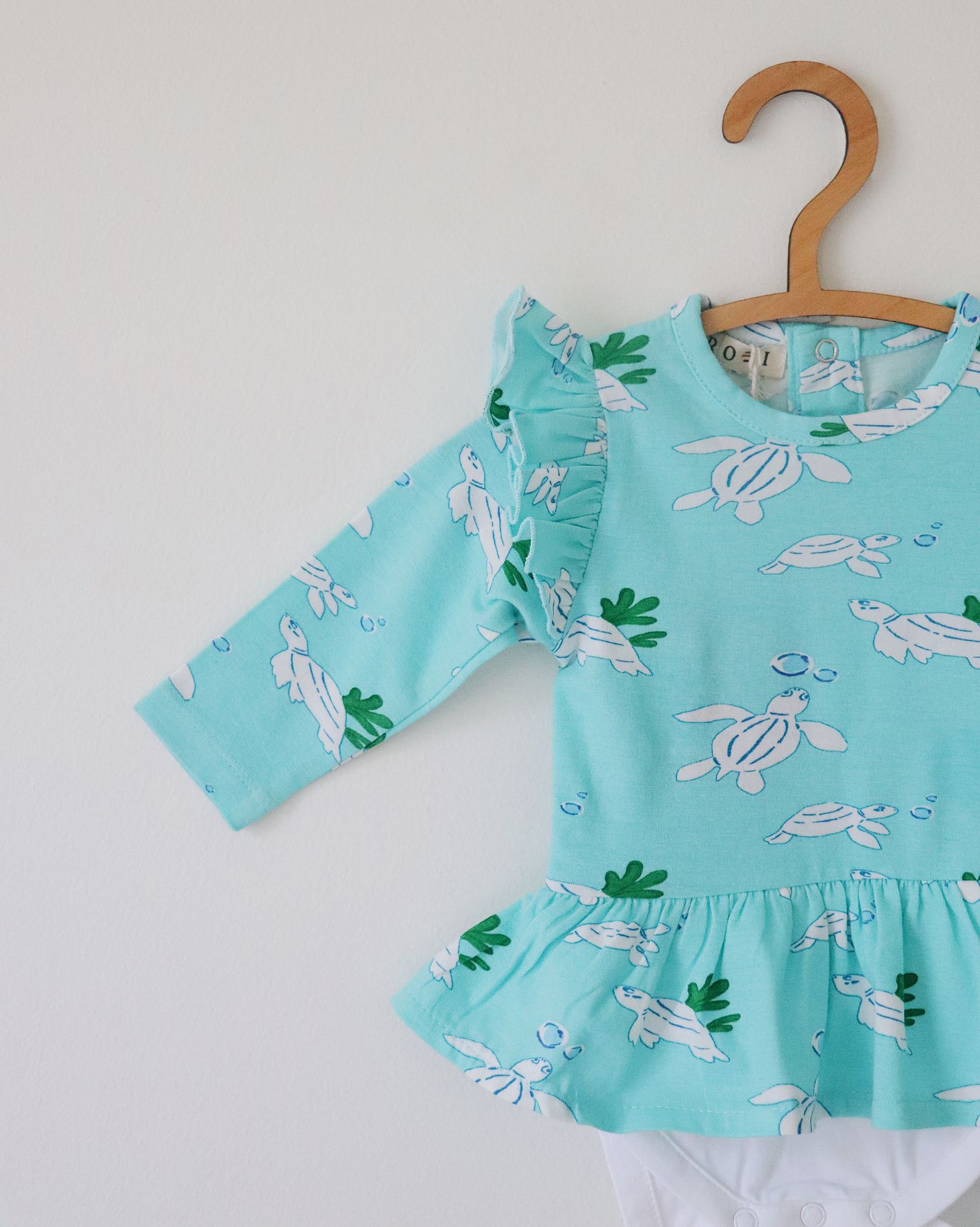 Organic Peplum Onesie (Turtle Print)