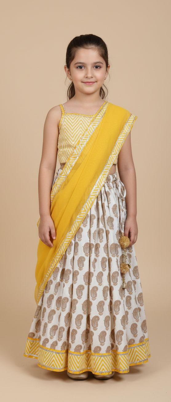 Yellow paisley lehenga with zig zag blouse and net dupatta