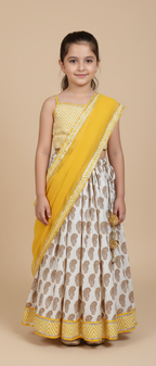 Yellow paisley lehenga with zig zag blouse and net dupatta